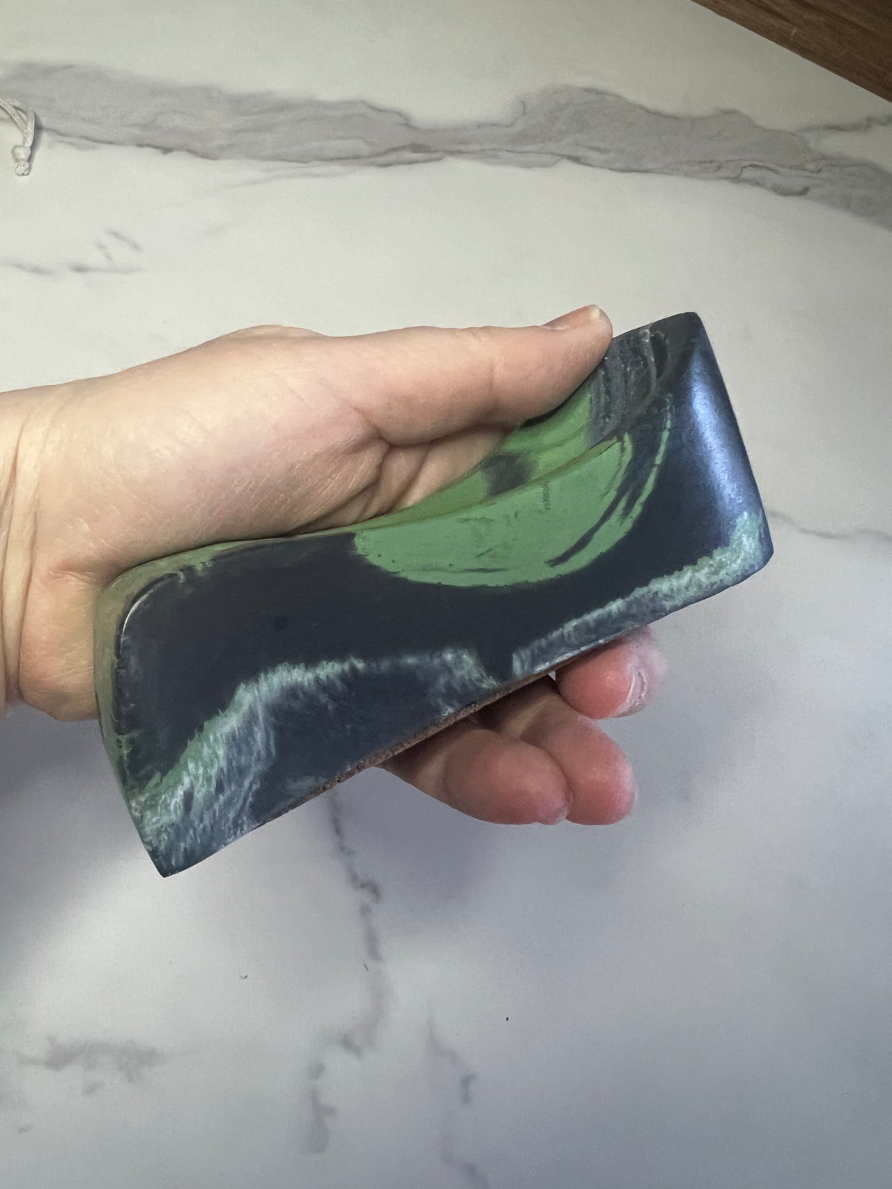 #57 green marbled concrete pipe rest