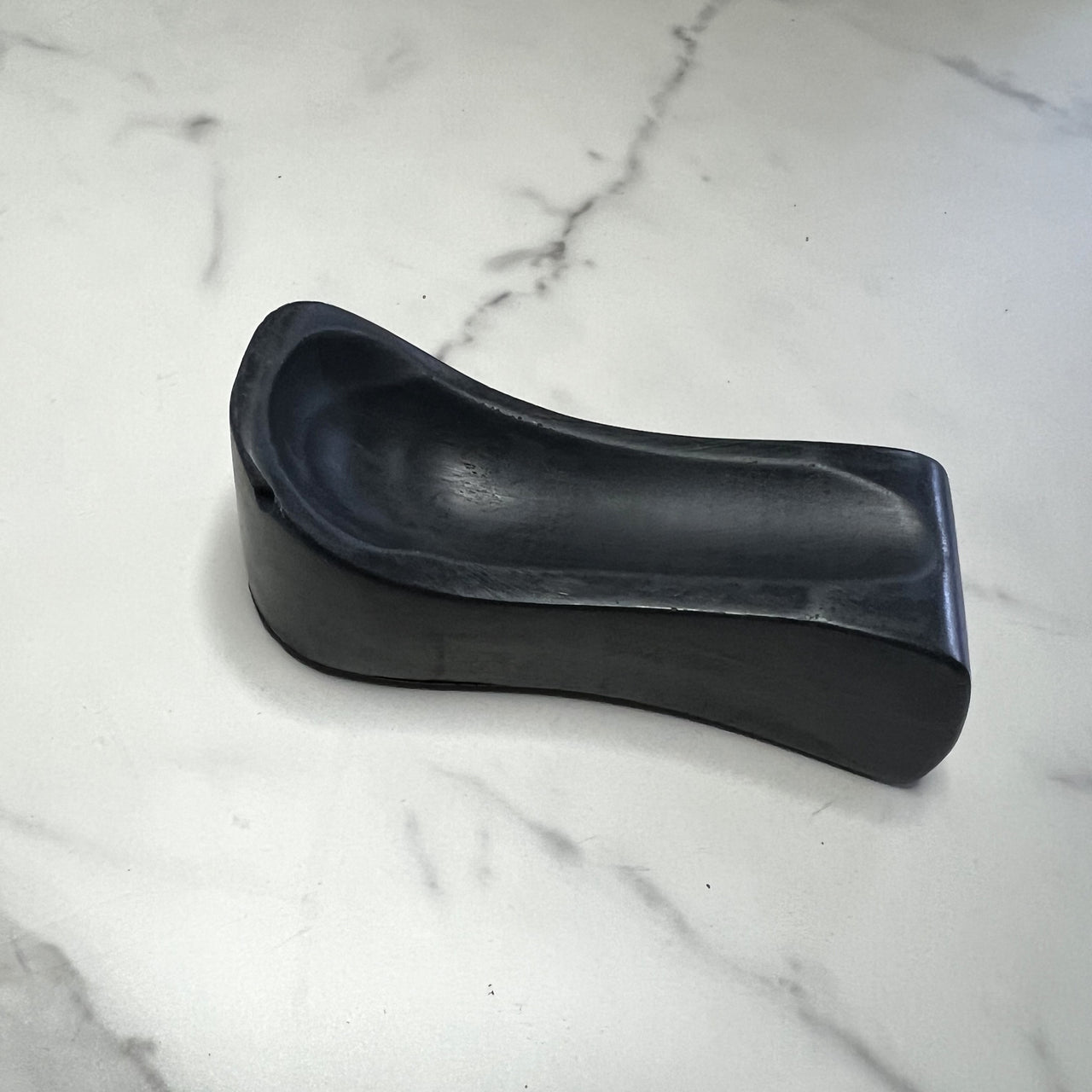 #3 black concrete pipe rest