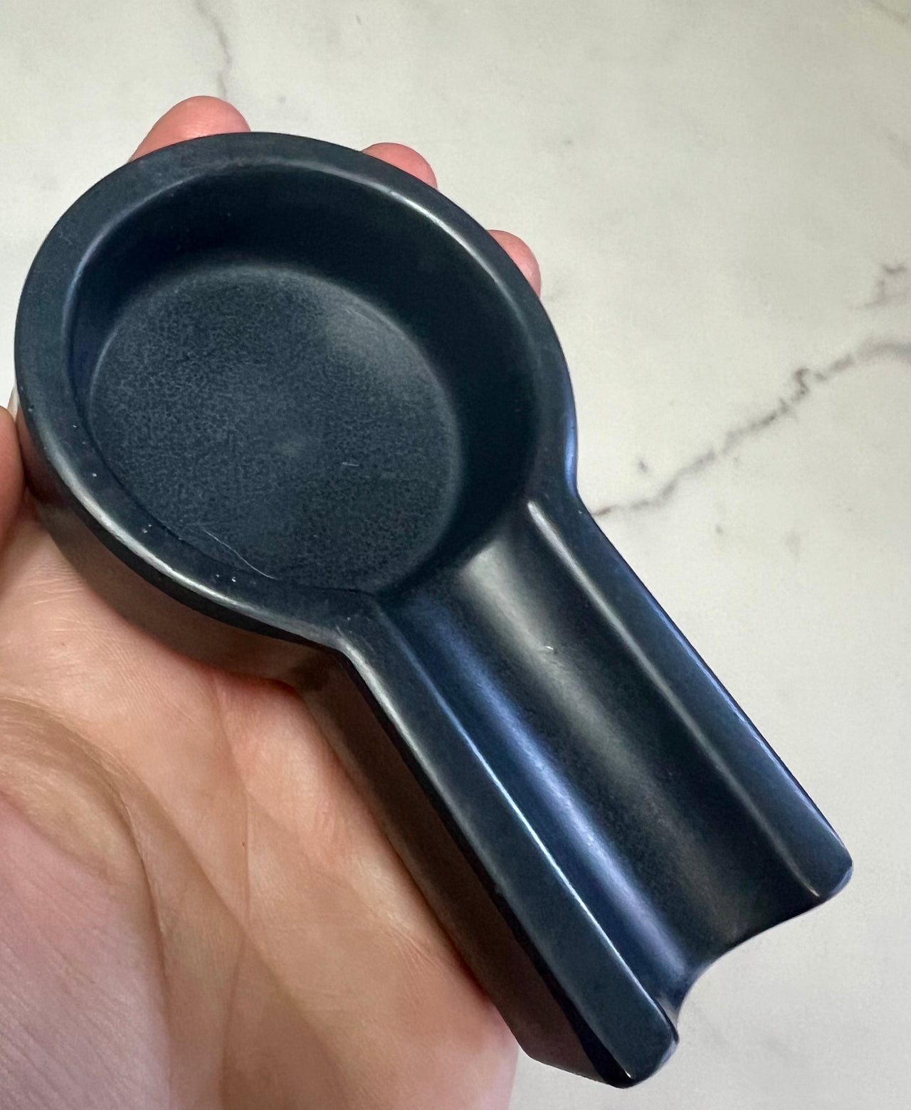 black small concrete cigar ashtray